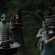 A macabre funeral procession.